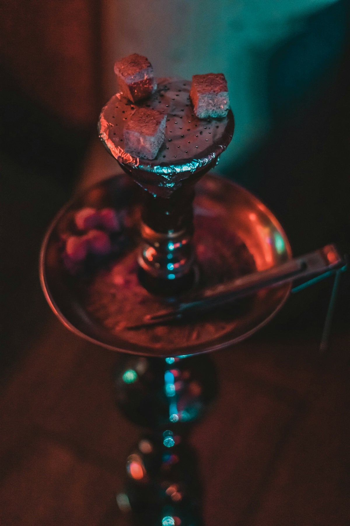 a chocolate dessert sitting on top of a metal plate